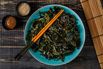 Wakame salad, raw seaweed, Japanese cuisine.