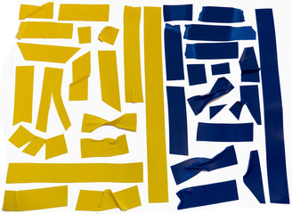Collection of yellow and blue adhesive tape pieces.