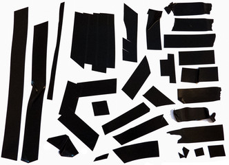 Collection of black adhesive electrical tape pieces.
