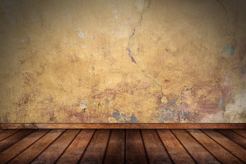 empty room with old stone concrete wall and wooden planks floor