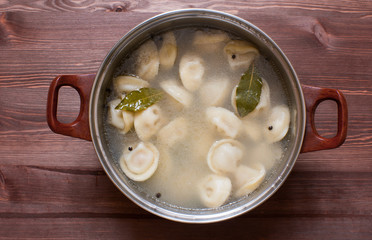 Dumplings in pot.