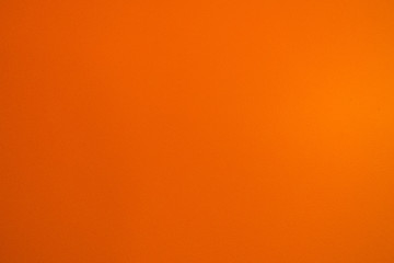 Orange colored wall texture background