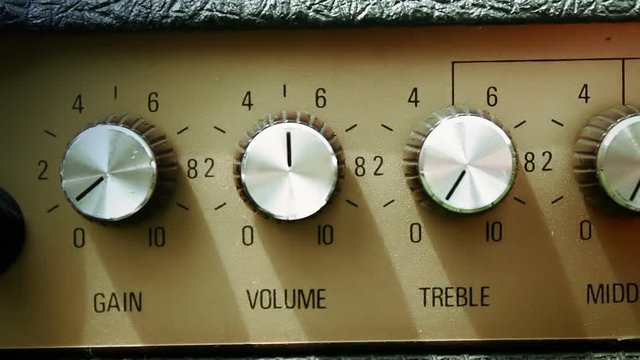 Adjusting a guitar amp for a performance