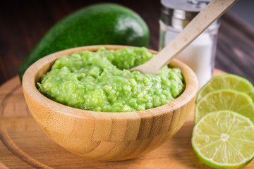 avocado Guacamole on molcajete real Mexican traditional procedur