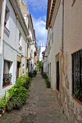 Fototapeta na wymiar Back street in Tthe old district of ossa de Mar, Spain