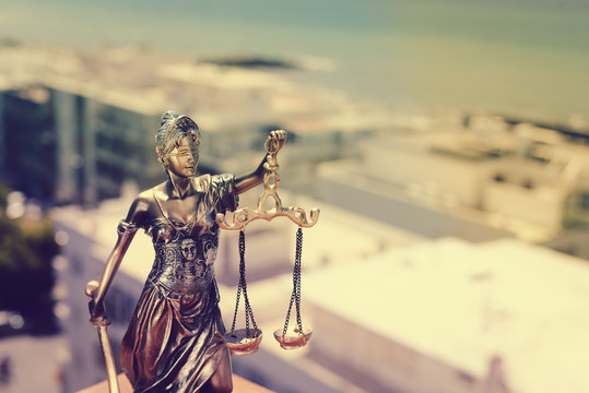 Lady Justice, statuette of the Themis goddess. Law concept
