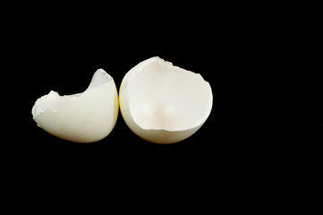 White Eggshell isolated on a black background