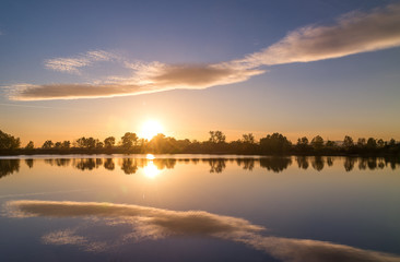 Fototapeta na wymiar Romantic sunset on the lake
