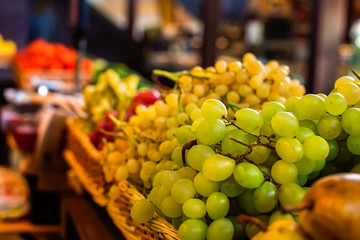 Ripe bunche of grapes in wicker boxes. 