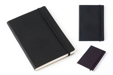 Black leather notebook isolated on white background.