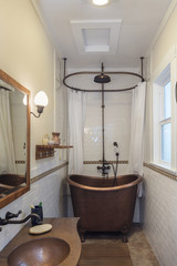 A Copper Bathtub interior in vintage bathroom.
