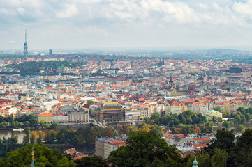 Fototapeta na wymiar Red roofs in the city Prague. Panoramic view of Prague