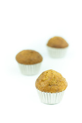 Banana muffin cupcakes isolated on white background