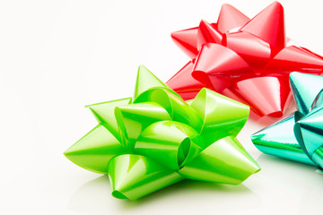 Three bows for presents on a white background.