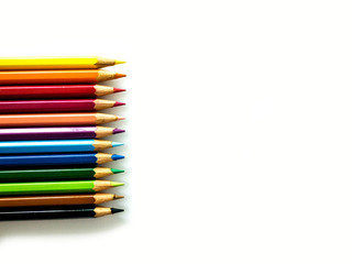 Colorful pencils on white background
