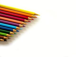 Colorful pencils on white background