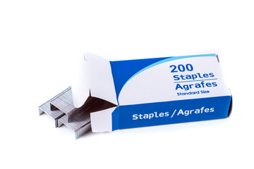 Generic office staples and staple box isolated on white background