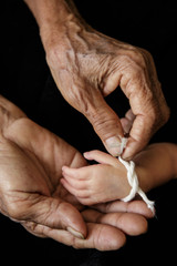 Grandma thread that tied the hands and pray, Lanna Thai Culture