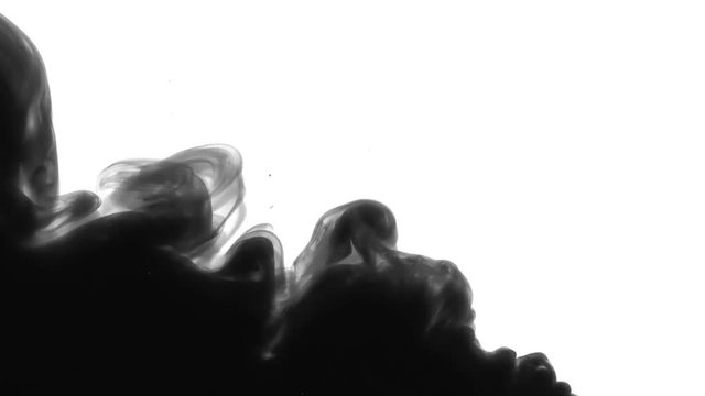 Black Ink Swirling Over Pure White Background. Fantastic texture to place in your projects as luma matte or layer transfer modes to delete white background.