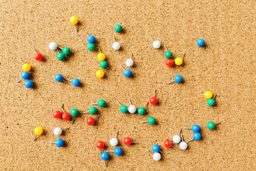 For beautiful background with cork board texture color pins