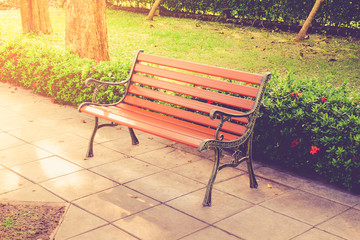 Wooden bench in the city park vintage color