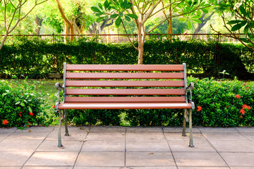Wooden bench in the city park - Powered by Adobe