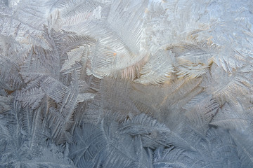 Winter patterns on glass from ice