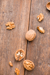 Walnuts on wooden table. Nuts. Top view.