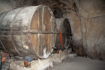 wood wine barriques in a cellar , Campania , Italy 