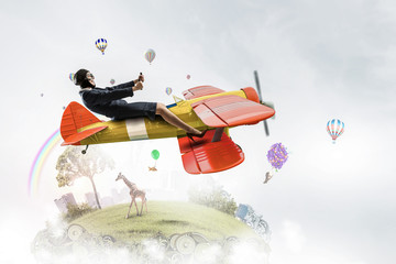 Woman in drawn airplane . Mixed media