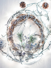 Christmas decorations on white wooden background. Shallow depth of field.