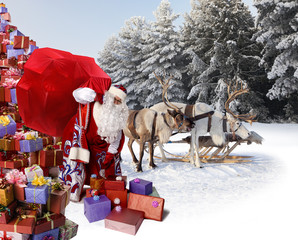 Santa Claus and his reindeer with gifts