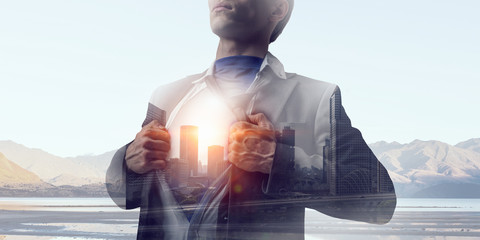 Exposure of businessman and modern city . Mixed media