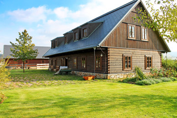 Fototapeta na wymiar View of traditional european wooden village house. 