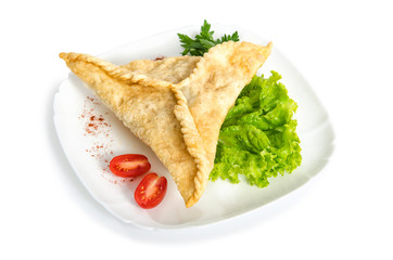 sharbin with lamb parsley and salad on white plate