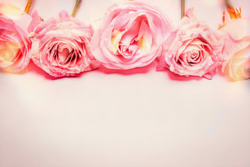 Pink rose floral border with bokeh light, romantic