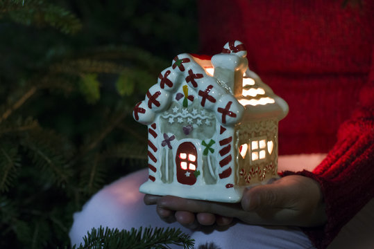 Christmas House. Woman Hold Chrismas House.