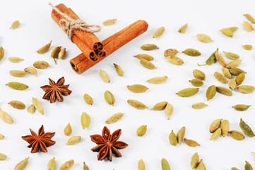 Cinnamon sticks, cardamon and star anise closeup. Background of spices.