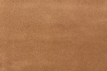 Close up of a orange leather texture.