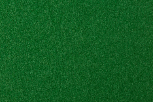 Green felt texture for poker an casino theme.
