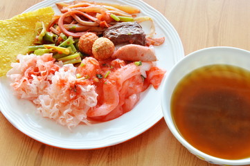 rice noodle with fish and shrimp ball dress red soy sauce