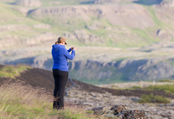 Shot of a young woman hiking in Iceland