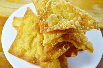 deep fried crispy dumpling strips on plate
