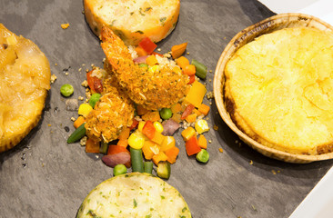 fried with vegetables and quinoa seeds in the ethnic restaurant