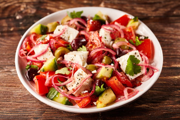 Close up of fresh tomato and olive salad