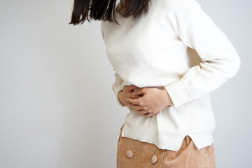 Young Woman suffer from stomachache