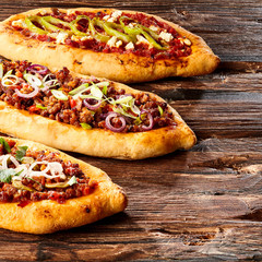 Baked bread stuffed with meat and peppers