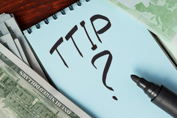 TTIP written in a note. Transatlantic Trade and Investment Partnership concept.