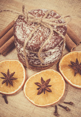 Gingerbread cookies, cinnamon and orange slices. Christmas decoration.