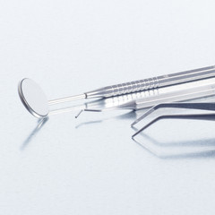 Fototapeta premium Dentist's tools (mirror, probe, tweezers)
